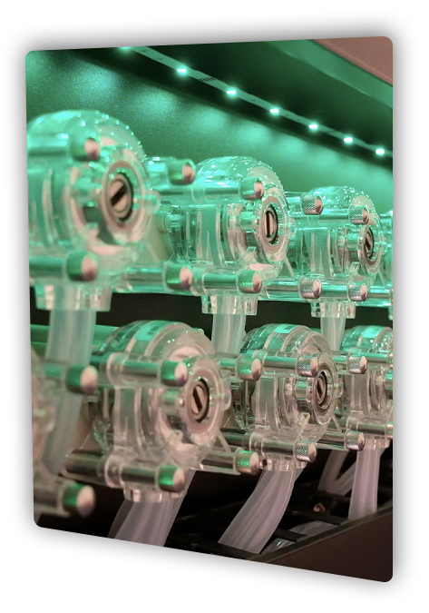 Rows of the Paragon's clear injection dosing pump heads that meter each nutrient into the feed